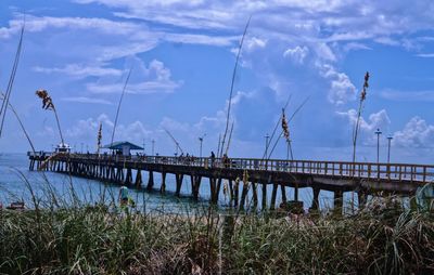 Panoramic view of sea against blue sky