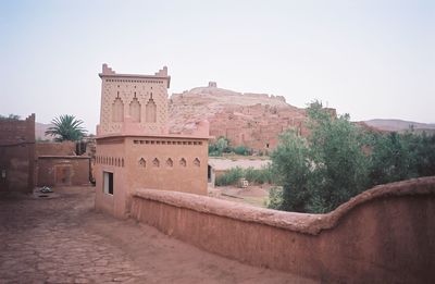 Historic buildings against clear sky