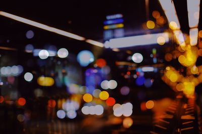 Defocused image of illuminated lights at night