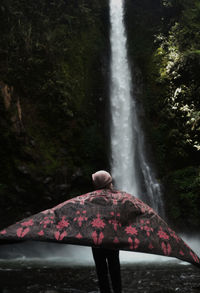 Scenic view of waterfall in forest