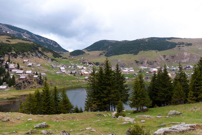 Scenic view of landscape and mountains against sky