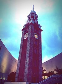 Low angle view of clock tower against sky