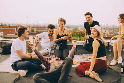 Group of people sitting outdoors