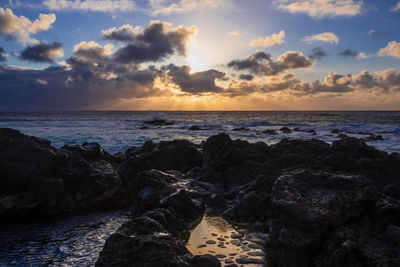 Scenic view of sea against sky during sunset