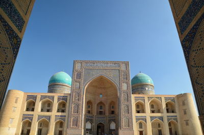 Low angle view of cathedral against clear blue sky