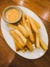 High angle view of fried egg in plate on table