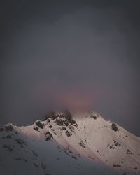 Scenic view of mountains against sky during winter