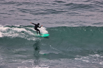 Man surfing in sea