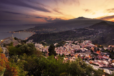 High angle view of townscape against sky during sunset