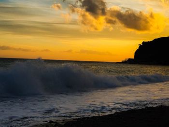 Scenic view of sea against sky during sunset