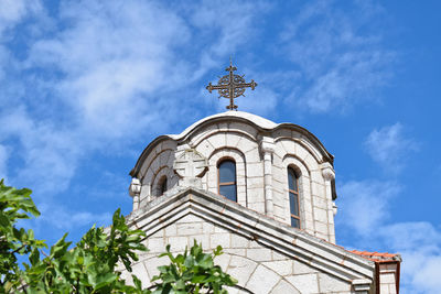 Low angle view of building against blue sky