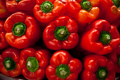 Full frame shot of red bell peppers for sale in market