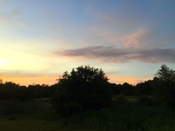 Scenic view of landscape at sunset