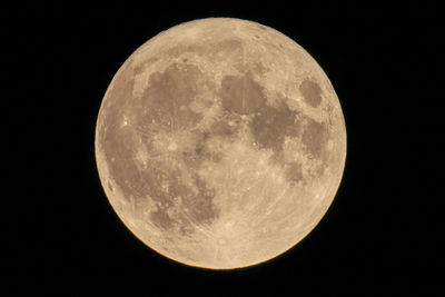 Low angle view of moon against sky at night