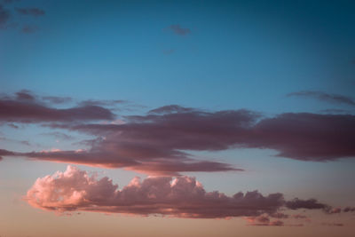 Low angle view of dramatic sky during sunset