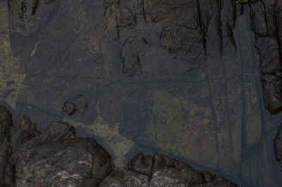 Full frame shot of rocks by wall