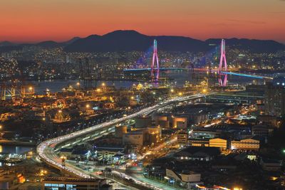 High angle view of illuminated city at night