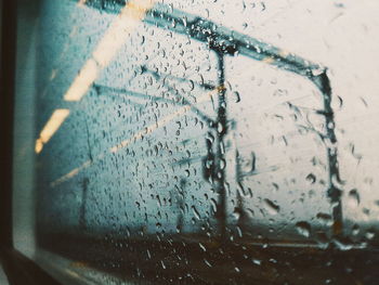 Close-up of water drops on glass window