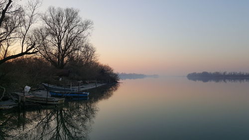 Scenic view of lake during sunset