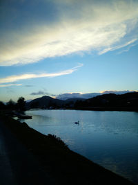 View of lake against cloudy sky