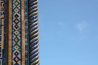 Brick wall with majolicas detail. registan square. samarkand. uzbekistan