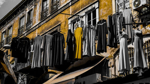 Low angle view of clothes drying on building