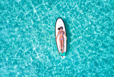 High angle view of woman in swimming pool