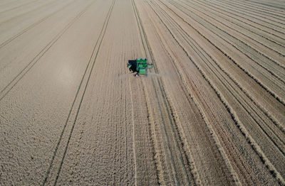 High angle view of agricultural machinery on field