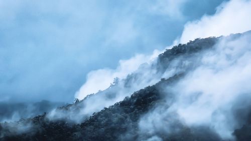 Low angle view of mountains against sky