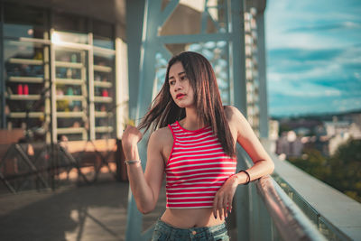 Full length of woman standing outdoors