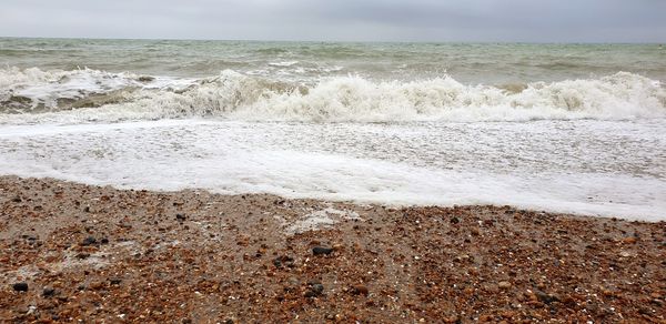 Scenic view of beach against sky