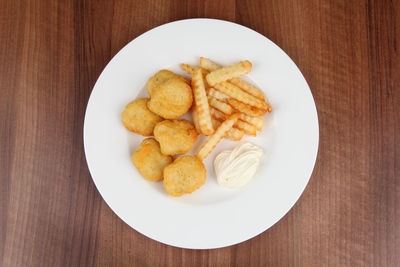 Directly above shot of food served on table