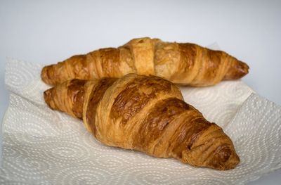 Close-up of bread on white background
