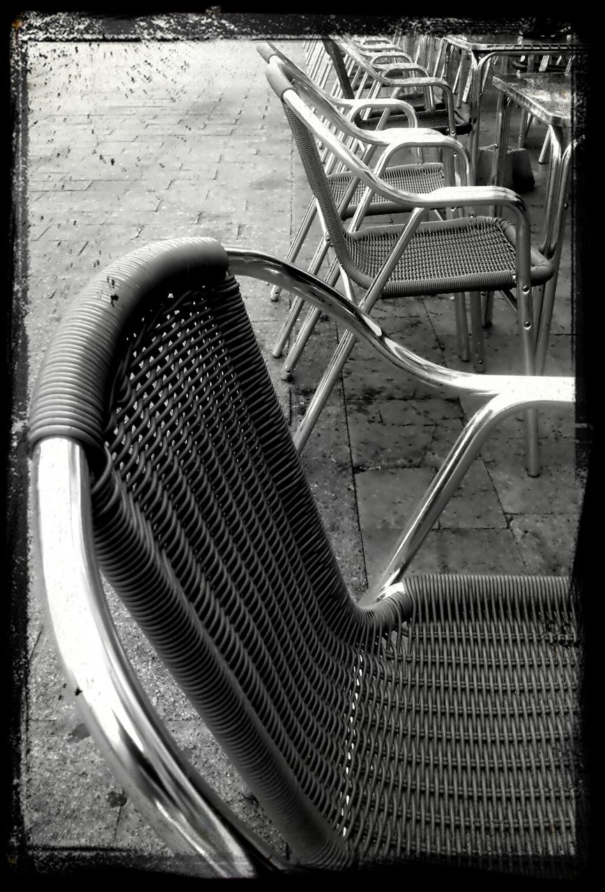 transfer print, auto post production filter, metal, high angle view, indoors, empty, chair, no people, absence, wood - material, close-up, built structure, day, steps, pattern, metallic, sunlight, architecture, railing