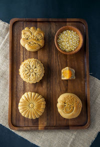 Moon cake for mid autumn festival on the table with dark background
