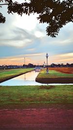Scenic view of landscape against cloudy sky