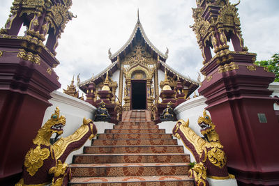 Low angle view of statue against sky