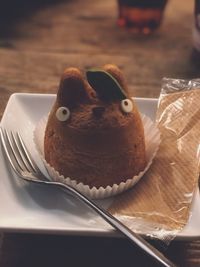 Close-up of cake in plate on table