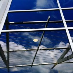 Low angle view of building against blue sky