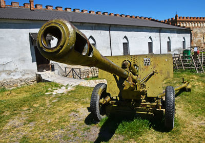 Old artillery in museum on sunny day