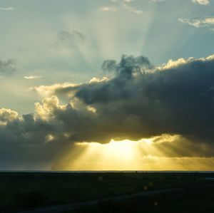 Scenic view of dramatic sky during sunset