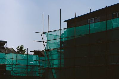 Low angle view of modern building against clear sky