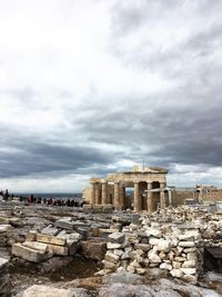 Old ruins of building against cloudy sky