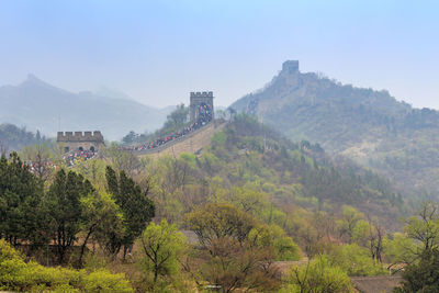 Scenic view of mountains against clear sky at great wall in badaling china