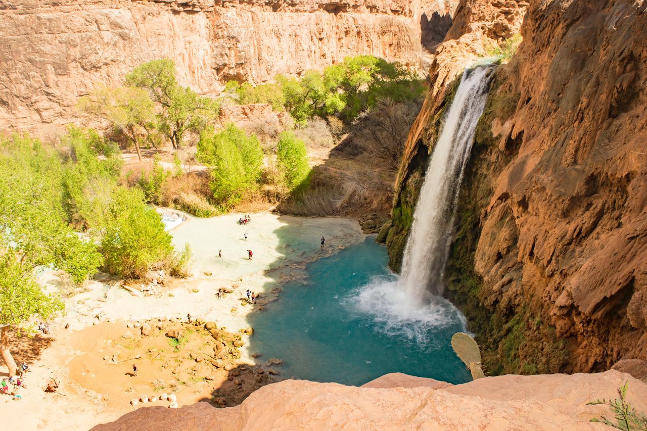 rock - object, rock formation, geology, nature, scenics, beauty in nature, tranquil scene, travel destinations, water, tranquility, physical geography, outdoors, tourism, no people, day, cliff, river, waterfall, landscape, desert, tree, hot spring, sky