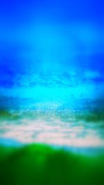 Surface level of landscape against blue sky