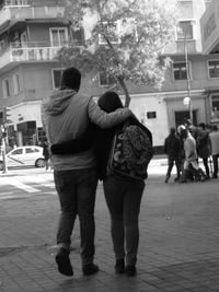 Full length of woman standing in city