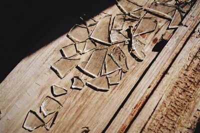 High angle view of text on wooden table