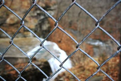 Chainlink fence seen through chainlink fence