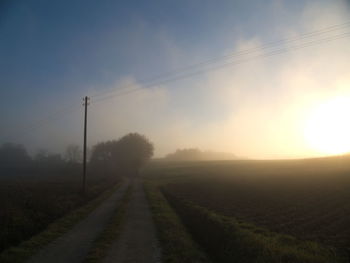 Road passing through field